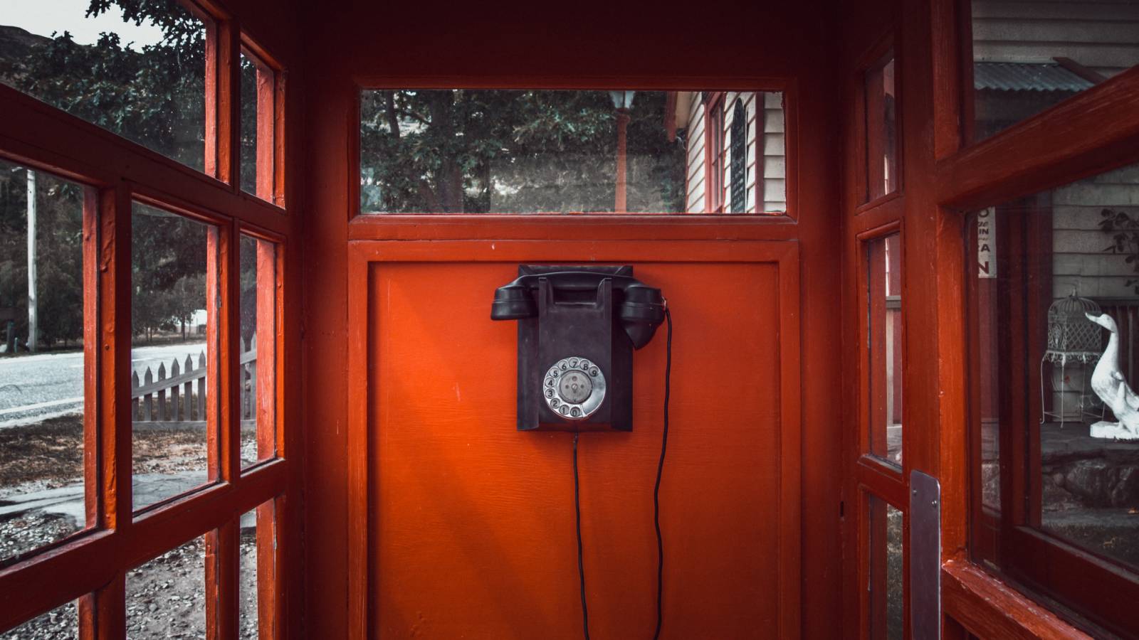 Telephone booth with black pick up phone